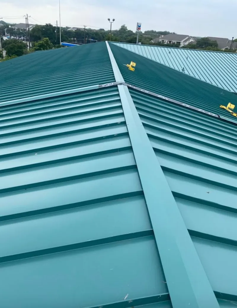 Green commercial metal roof ridge and valley for Metal Roof Repair in Crystal City